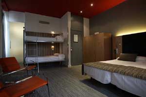 Family triple with queen bed, and private facilities
